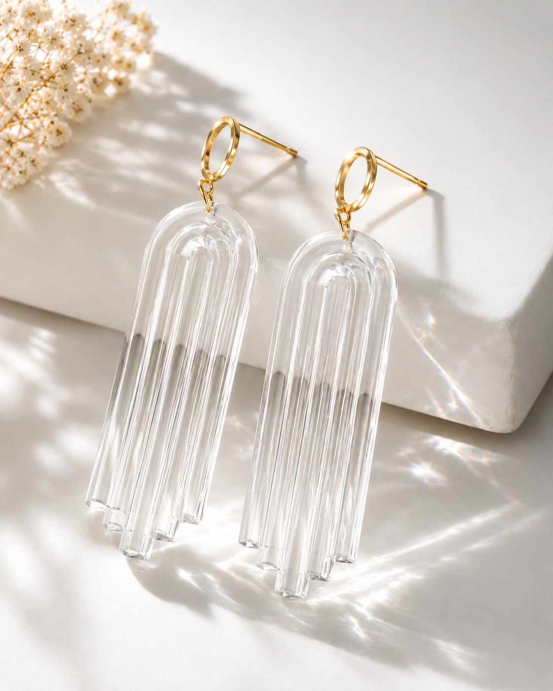 Clear bespoke resin drop earrings with gold fittings