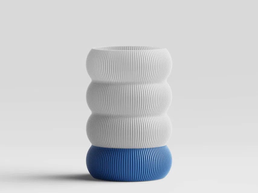 Sculptural white and blue ribbed 3D-printed vase